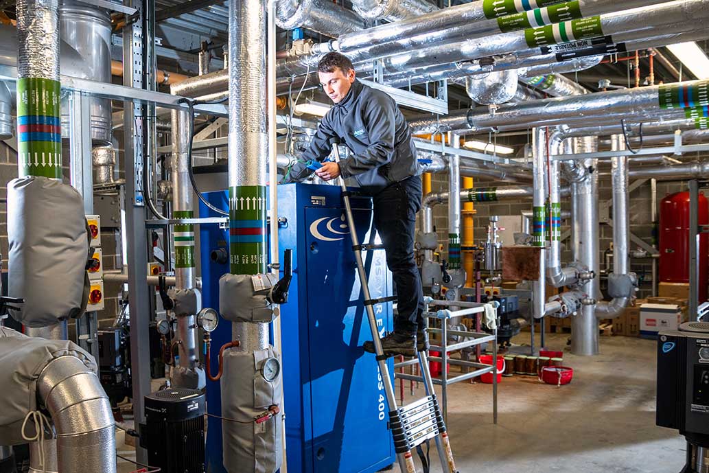 Remedial-Works Aquatrust employee performing legionella remedial works