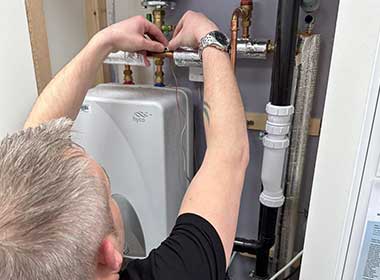 remote-water-monitoring-installation Aquatrust installing a remote water monitoring system